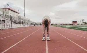 Athletes doing 15 minute stretching workout for running, cycling, and triathlon recovery