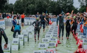 Triathlete riding a bike during a long-distance endurance session as part of a 24-month Ironman training plan