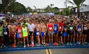 Runners gathered in front of the start line before a half marathon