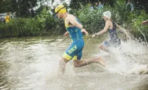 Athletes entering the swim leg during one of the best triathlons in Japan.