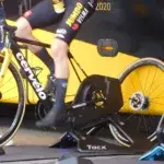 Cyclist warming up on Tacx smart trainer for Zwift or MyWhoosh virtual ride