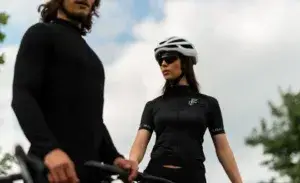 Two cyclists pausing during a bike cross training session for runners outdoors