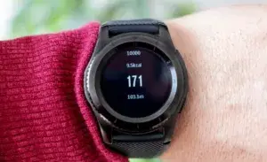 Smartwatch showing heart rate during a run
