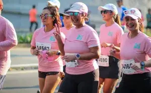 Runners enjoying the best marathons in Singapore during a city race event