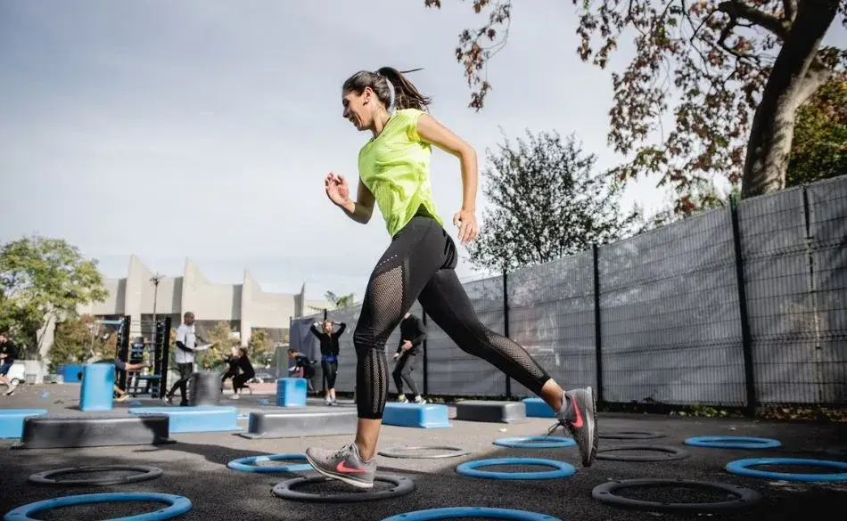 Woman training outdoors as part of cardiovascular fitness workouts