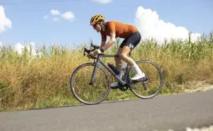 Cyclist training on the road focusing on how to increase endurance in cycling