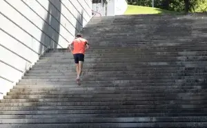 Runner doing stair running workout outdoors