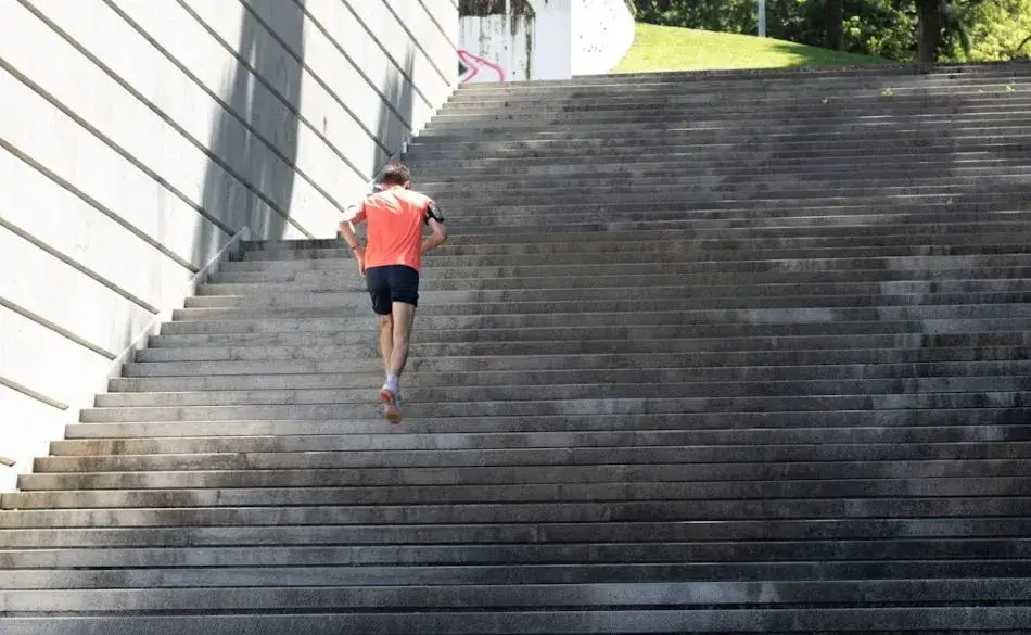 Runner doing stair running workout outdoors
