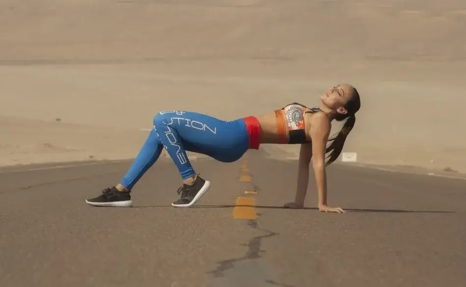 stretches before running outdoor warm up exercise on road