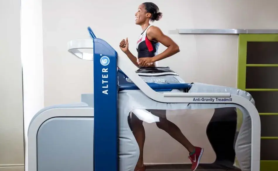 Athlete running on the Alter G anti gravity treadmill during rehab training