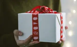 Beautifully wrapped gifts for runners with holiday ribbon