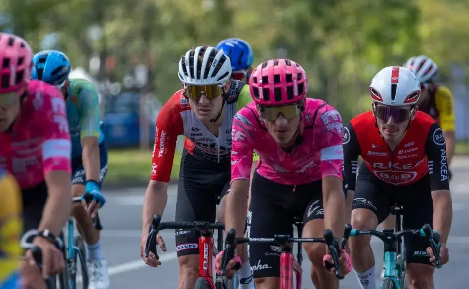 Cyclists riding in a group demonstrating maximum overload for cyclists during a high-intensity training session