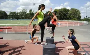 Person training in the gym showing effective ways to boost metabolism through exercise and movement