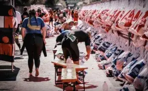 Ironman transition area showing athletes preparing for the run, illustrating best brick workouts for triathletes.