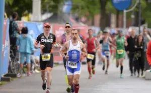 Triathletes running at a European event, representing the Best IRONMAN 70.3 Races in Europe