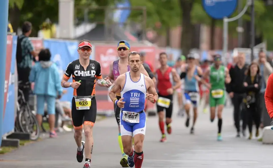 Triathletes running at a European event, representing the Best IRONMAN 70.3 Races in Europe