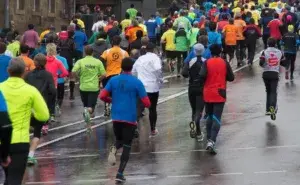 Runners working to improve their running stamina during a large community race