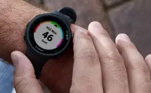 Person checking Garmin watch showing VO2 max score to understand what is a good VO2 max score