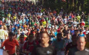 Large crowd of runners competing in a mass participation road race