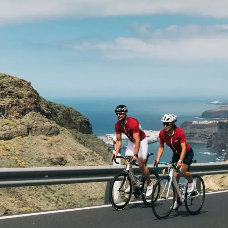 Two triathletes training on road bikes in the Sydney hills